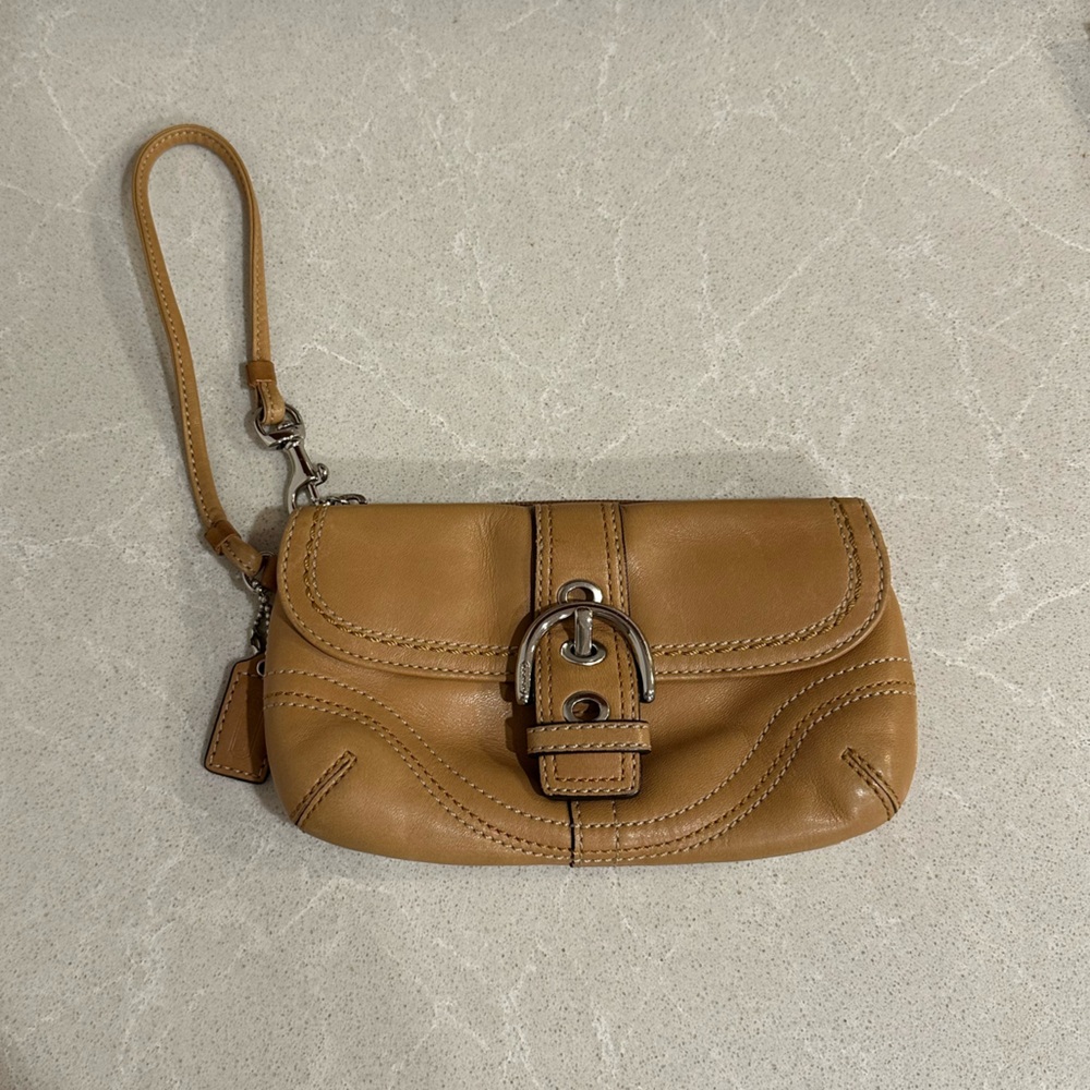 Coach wristlet and charm